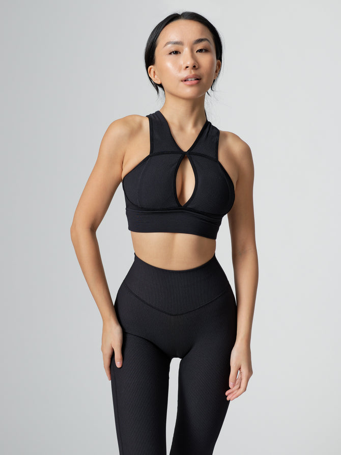 Would you wear this look? 😍 Hilde is wearing the Sphynx Ribbed Sports Bra  paired with the Material Girl Legging in Onyx Black. The Sp